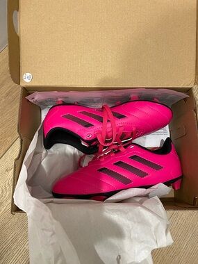 Adidas Pink Youth Soccer Cleats with Black Stripes